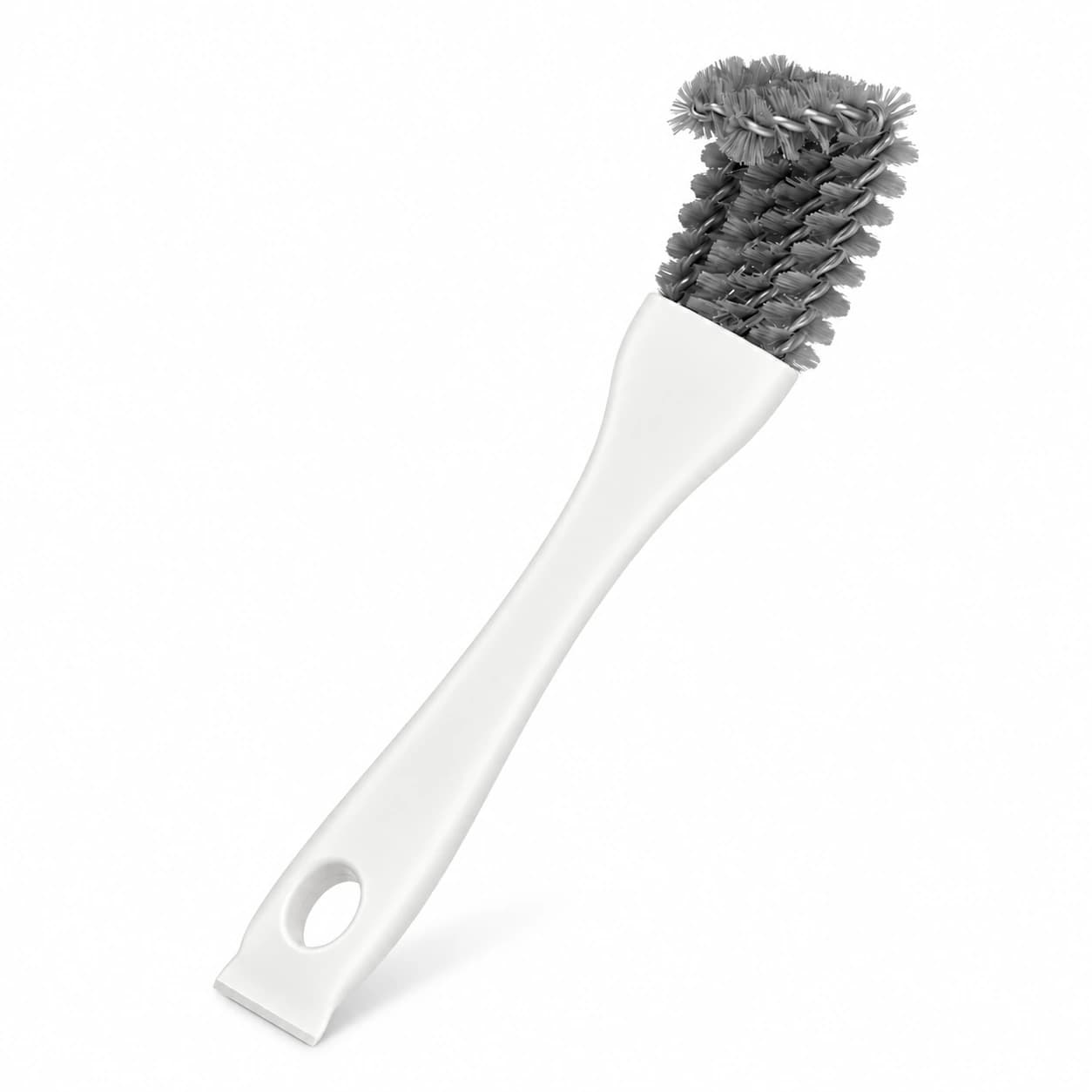 Brosse de nettoyage pour cage d'oiseaux vue de trois quarts, manche blanc, tête en éventail grise et grattoir d'angle