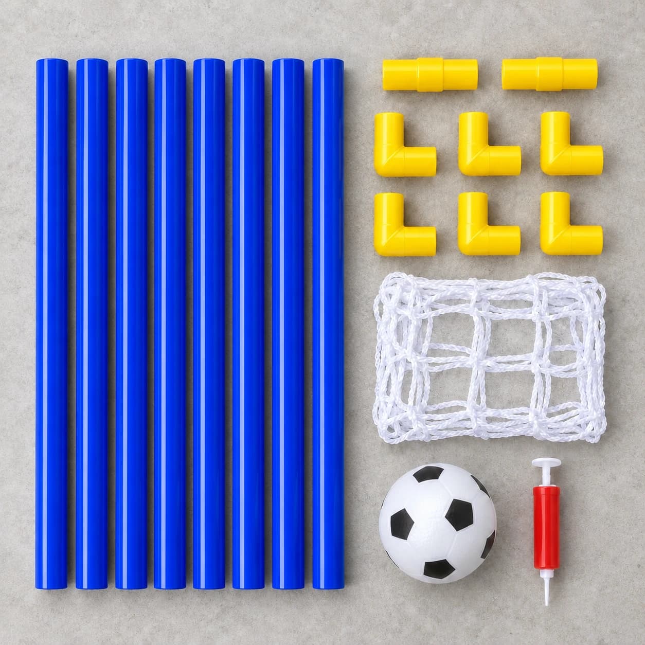 Le contenu du colis à plat : huit tubes bleus, connecteurs jaunes, filet, ballon et pompe