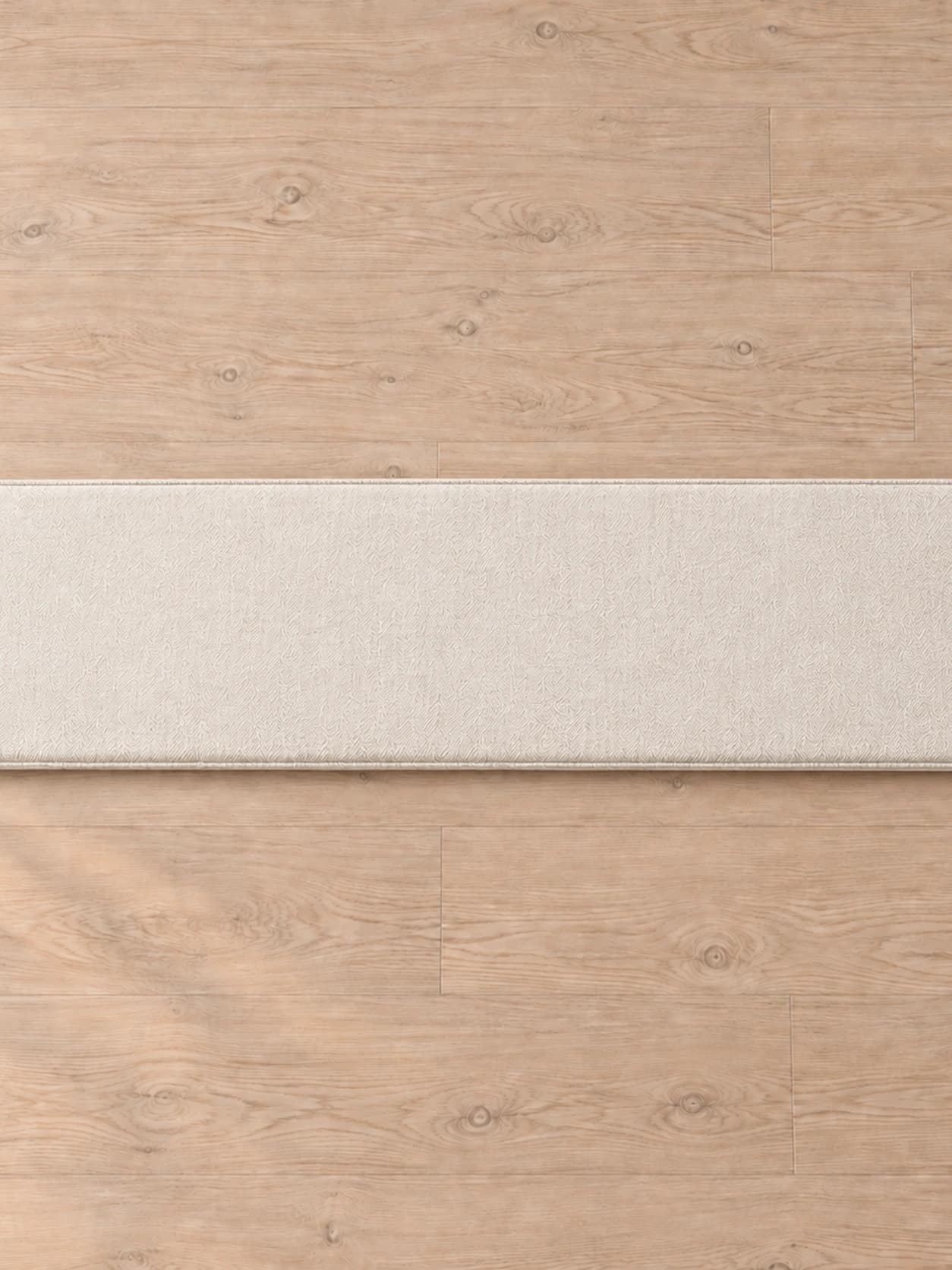 Contenu du colis vu de dessus : une seule galette d'assise blanc cassé de 120 sur 40 cm, posée à plat