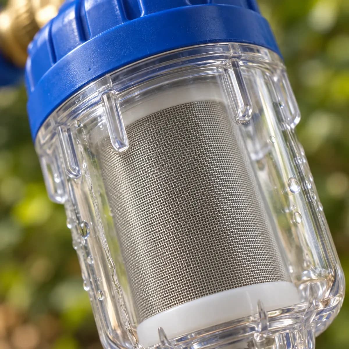 Écran filtrant en inox 316 de 40 microns vu à travers le corps transparent