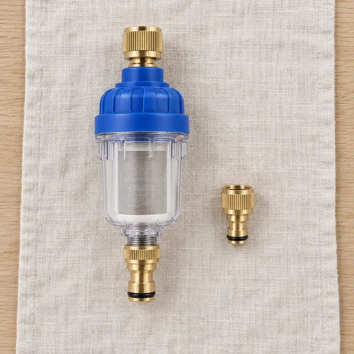 Contenu du colis : préfiltre assemblé et adaptateur laiton de 16 mm côte à côte