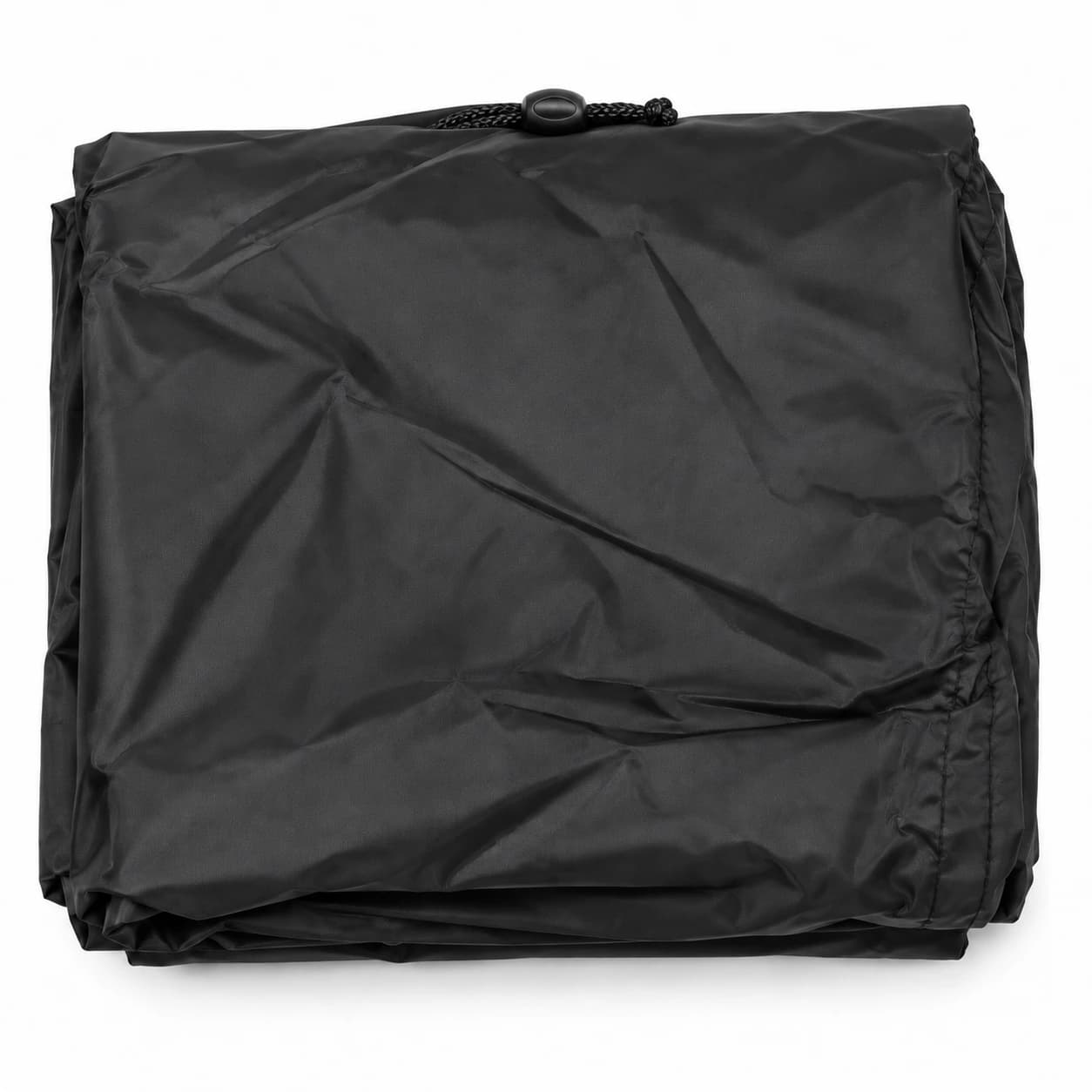 Le manchon de protection plié en paquet compact, cordon de serrage et taquet rangés le long du pli