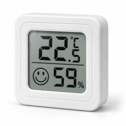 Mini thermomètre et hygromètre sur fond blanc