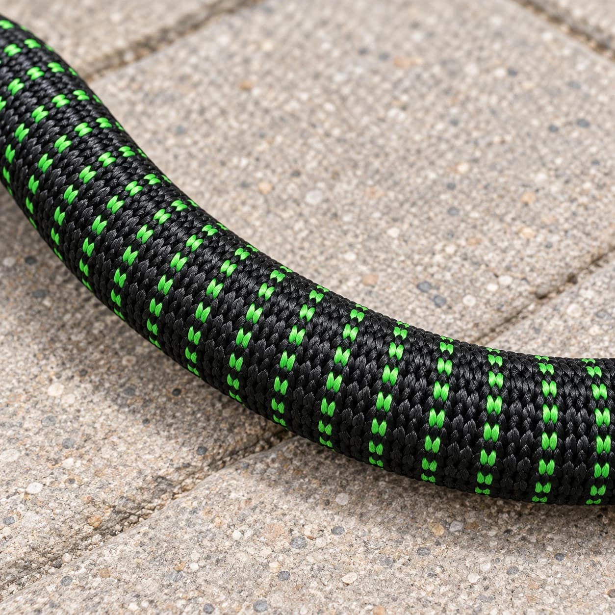 Texture de la gaine tissée noire et verte